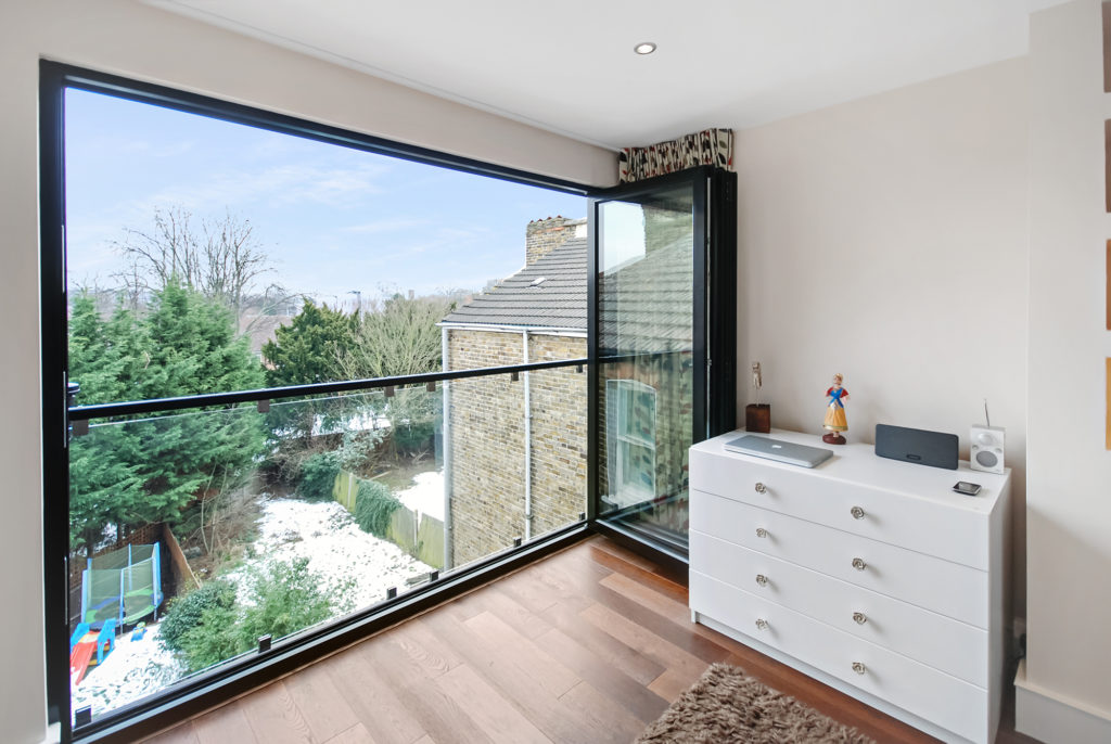 Loftt conversion ideas get more light with bi-fold doors.