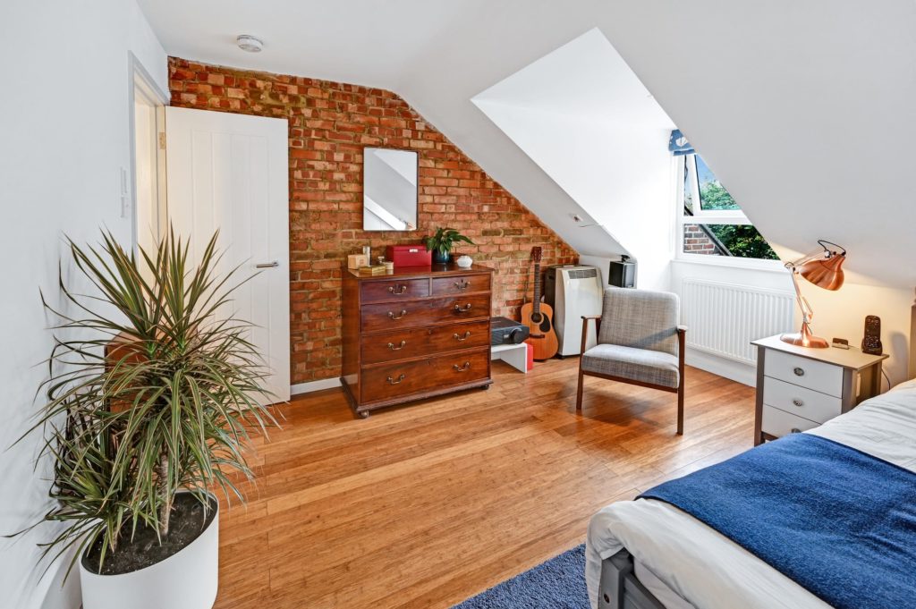 Loft conversion idea for a home office with real wooden floors