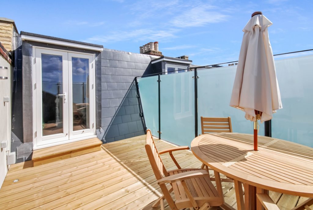Mansard loft conversion with a wonderful rear roof terrace at a property in Putney South West London, SW1